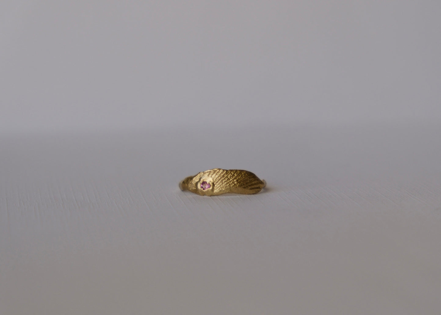 Seashell Fragment Ring with Embedded Pink Sapphire